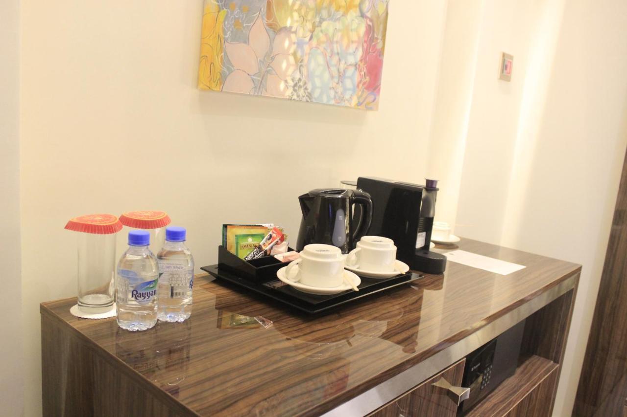 Tio Sea Resort Аль-Хор Экстерьер фото A coffee and tea tray in a hotel room